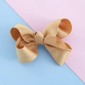Charming champagne gold grosgrain ribbon bow hair clip for girls on colorful background - Champagne