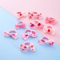 10-piece pink bow hair ties set for girls featuring strawberry and polka dot patterns - Pink Series