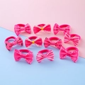 Set of 10 pink bow hair ties for girls with stripes, dots, and cherry patterns - Rose Red Series
