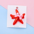 Red starfish hair clip with pink mesh bow accessory for girls on display card - Red Starfish