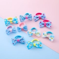 Kids hair ties set with colorful butterfly bows and floral patterns in blue and pink - Blue Series