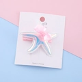 Starfish hair clip with iridescent finish and pink silk bow on display card - White Starfish