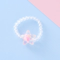Elastic beaded ring for kids featuring iridescent star charm and pastel macaron colors - Star Style / Clear