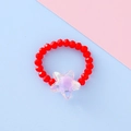 Elastic beaded ring for kids featuring a red acrylic bead band and iridescent star charm - Star Style / Red