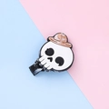 Barrette d'Halloween tête de mort avec chapeau brun sur fond rose et bleu - Crâne 2