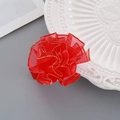 Red fabric flower hair clip for kids with elegant gold trim petals on a ceramic dish - Gold-Edged Flower Hair Clip