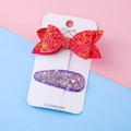Sparkly set with red sequin bow and purple glitter drop hair clips on display card - Red