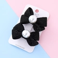 Pair of elegant black glitter bow hair clips with white pearls on a display card - Black (Glitter)
