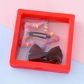 Set con fermaglio a stella di peluche giallo e fiocco nero in una scatola espositiva rossa - Stile 2 Rosso Rosa