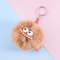 Cute brown plush monster keychain with big eyes and sharp teeth on a colorful background - 5# Brown Funny Monster (tw24116)
