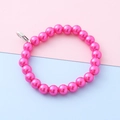 Kinderarmband met fuchsia faux parels en zilveren karabijnsluiting op kleurrijke basis - Kralen Creolen / Rozerood