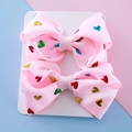 Pink ribbon bow hair clips with colorful metallic heart patterns for girls set of two - Pink
