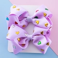 Set of two purple ribbed ribbon hair clips with colorful metallic heart sequins - Purple
