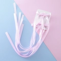 Fermagli per capelli con fiocco di raso rosa chiaro e lunghe nappe su cartoncino - Rosa