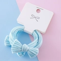 Elastic light blue bow hair tie with ribbed texture on display card for children - Light Blue