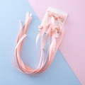 Lot de quatre pinces à cheveux noeud en satin rose clair avec de longs glands - Rose racine de lotus