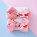Pink grosgrain ribbon bow hair clips set for kids on a colorful display card - Light Pink
