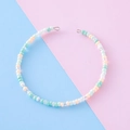Handmade colorful bead bracelet with mint green and orange beads on pastel background - Mint and Orange Mix (9#)