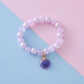 Charming purple beaded bracelet with faux pearls, crackle beads and a shell pendant - Shell Style / Purple