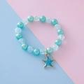 Cute beaded bracelet with light blue pearls, crackle beads and a seahorse charm - Starfish Style / Blue
