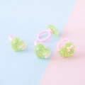 Anelli rosa in plastica per bambine con cuori in resina verde e glitter colorati - Cuore Verde