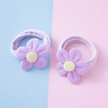 Set of two purple flower hair ties with yellow centers and ribbed fabric texture - Purple