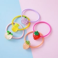 Five elastic kids hair ties with resin fruit charms like grape, peach, and carrot - Random Color