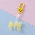Detail of yellow acrylic bow pendant with pearl beads and matching lobster clasp - Yellow 1#