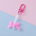 Close-up of pink bow pendant with acrylic faceted beads and pink metal snap hook - Rose Red 2#