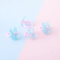 Set di quattro anelli a coniglietto in resina blu con glitter e dettagli di fiocco rosa - Stampa Coniglio Blu