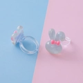 Two-piece children's transparent resin rings featuring blue glitter rabbit motifs - Rabbit