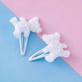 Pair of cute white plush bear hair clips with metal BB clips on a pastel background - White Bear