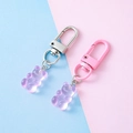 Set of two purple gummy bear resin pendants with silver and pink lobster clasps - Painted Clasp / Pink