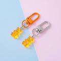 Cute yellow resin gummy bear keychain set with orange and silver metal swivel hooks - Painted Clasp / Orange