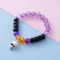 Kids Halloween beaded bracelet with purple beads and silver skull charm pendant - Skull