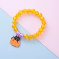 Halloween beaded bracelet for kids with pumpkin and black cat charm in yellow and purple - Pumpkin Cat