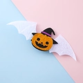Halloween pumpkin witch hat hair clip with white bat wings on soft pastel background - Pumpkin 1