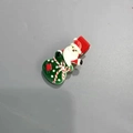 Détail de la pince à cheveux Noël avec Père Noël et petit sac cadeau vert - Père Noël aux Cadeaux