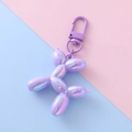 Portachiavi a forma di cane palloncino viola cangiante con chiusura a moschettone - Cane Palloncino