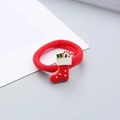 Close-up of a red elastic hair tie featuring a festive Christmas stocking and candy cane - Christmas Boot Hair Tie