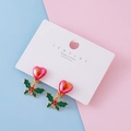 Christmas holly leaf ear clips with pink heart stud on white jewelry card - Holly Berry Style / Holly