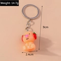 Dimensiones del llavero de cerdito fresa rosa y peso de 14,7g para bolsos - Cerdo Fresa