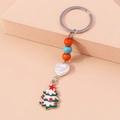 Minimalistische kerstboom sleutelhanger met kleurrijke kralen en wit hartvormig detail - Kerstboom