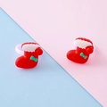 Set of two red Christmas stocking resin rings with green bows for kids holiday parties - Socks Style