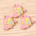 Drie kleurrijke vlinderhangers in roze, geel en blauw voor het maken van eigen sieraden - 10 Stuks Verpakking / Roze