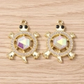 Macro detail of gold turtle charms with AB crystal centers and white zircon stones - Turtle (3061) / 5 Pieces / Gold Multicolor Rhinestone