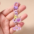 Detail view of purple chunky plastic chain keychain with heart candy pendant and bead - Round Ball Candy