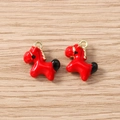 Close-up of red and black enamel horse charms with golden alloy hooks for DIY jewelry making - 5 Pieces / Gold Carousel Horse