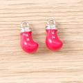 Rosa Boxhandschuh-Anhänger mit silbernen Sternen für DIY-Schmuck auf Holzgrund - Silber