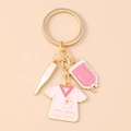 Detail of creative medical keychain with pink nurse uniform and thermometer charms - Pink Nurse Uniform Thermometer